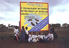 billboard text: Dear Men if you guys keep on chopping off the dignity of women and children... we will chop of yours
